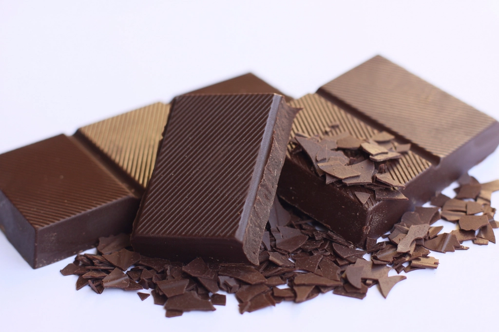 9 Healthy Foods That Lift Your Mood Naturally | Feel Happier Every Day 1 chocolate bars image